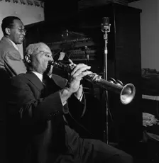 Portrait of Sidney Bechet and Lloyd Phillips, Jimmy Ryan's (Club), New York, N.Y., ca. June 1947. Creator: William Paul Gottlieb