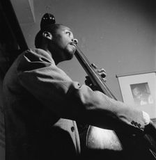Portrait of Slam Stewart, William P. Gottlieb's office, New York, N.Y., 1946. Creator: William Paul Gottlieb