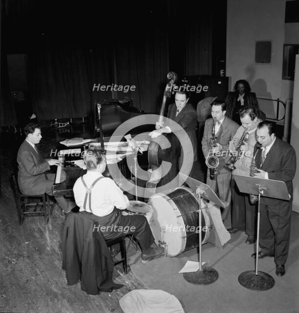 Portrait of Stan Freeman, Bunny Shawker, Bob Haggart, Art Drelinger...Columbia studio, N.Y., 1947. Creator: William Paul Gottlieb.