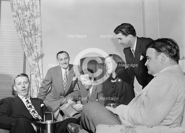 Portrait of Stan Kenton, Carlos Gastel, and Bob Gioga, New York, N.Y., 1947 or 1948. Creator: William Paul Gottlieb.