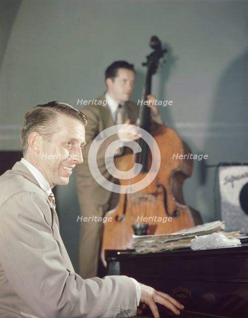 Portrait of Stan Kenton and Eddie Safranski, 1947 or 1948. Creator: William Paul Gottlieb.