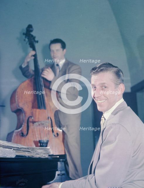 Portrait of Stan Kenton and Eddie Safranski, 1947 or 1948. Creator: William Paul Gottlieb.