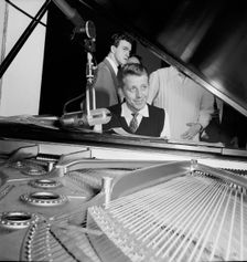 Portrait of Stan Kenton, Harry Forbes, and Pete Rugolo, Capitol studio, ca. Jan. 1947. Creator: William Paul Gottlieb