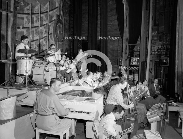 Portrait of Stan Kenton, Laurindo Almeida, Eddie Safranski, Bob Cooper, Art...Richmond, Va.(?), 1947 Creator: William Paul Gottlieb.