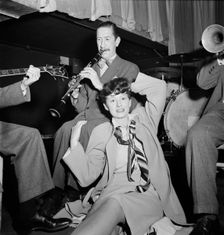 Portrait of Pee Wee Russell and Linda Keene, Eddie Condon's, New York, N.Y., 1946. Creator: William Paul Gottlieb