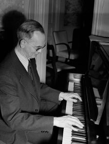 Portrait of Roy J. Carew in his home, 818 Quintana Place NW, Washington, D.C., ca. Feb. 1942. Creator: William Paul Gottlieb