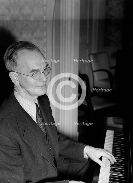 Portrait of Roy J. Carew in his home, 818 Quintana Place NW, Washington, D.C., ca. Feb. 1942. Creator: William Paul Gottlieb.