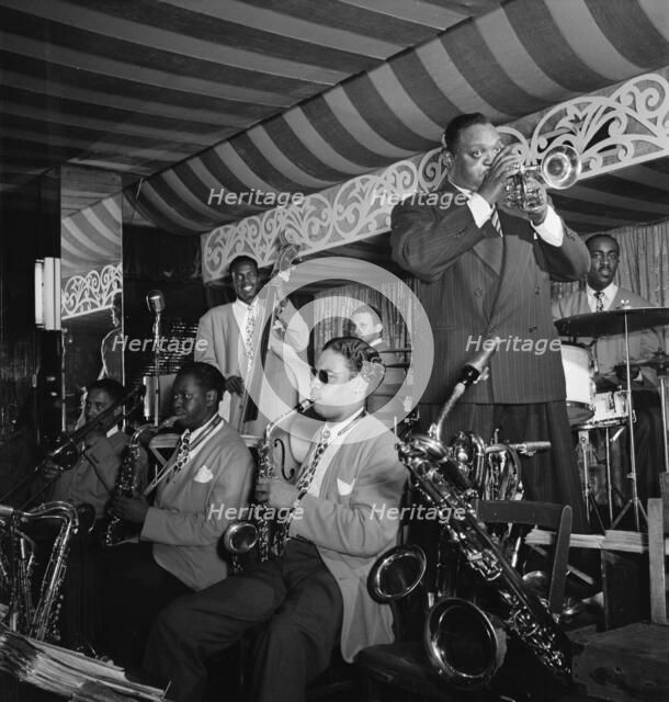 Portrait of Rex William Stewart, Aquarium, New York, N.Y., ca. Aug. 1946. Creator: William Paul Gottlieb.