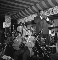 Portrait of Rex William Stewart, Aquarium, New York, N.Y., ca. Aug. 1946. Creator: William Paul Gottlieb