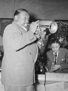 Portrait of Rex William Stewart, Aquarium(?), New York, N.Y., ca. June 1946. Creator: William Paul Gottlieb