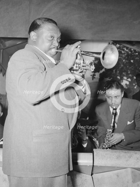 Portrait of Rex William Stewart, Aquarium(?), New York, N.Y., ca. June 1946. Creator: William Paul Gottlieb.