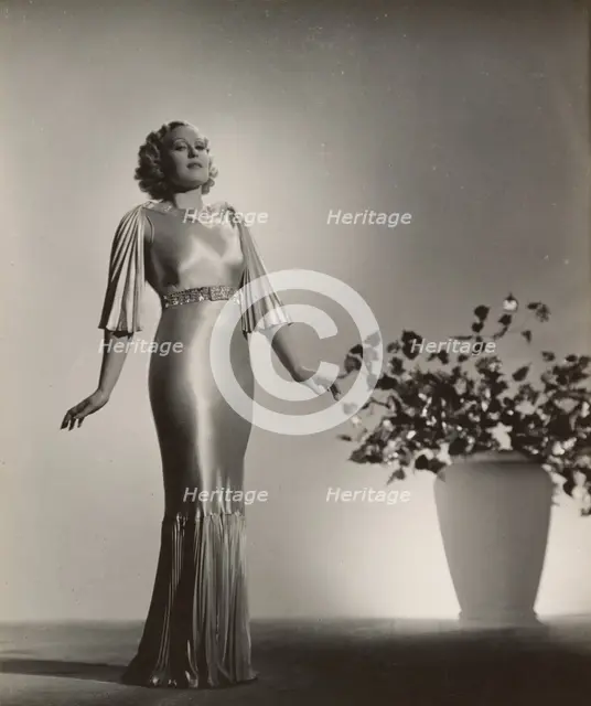 Portrait of woman in gown, late 1930s. Creator: Gunther Krampf.