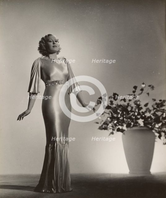 Portrait of woman in gown, late 1930s. Creator: Gunther Krampf.