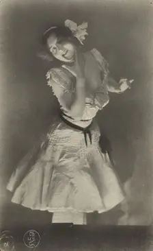 Portrait of woman in white dress, 1900-1915. Creator: Constant Puyo