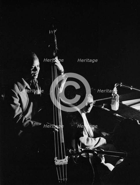 Portrait of Wesley Prince, Nat King Cole, and Freddie Moore, New York, N.Y., ca. July 1946. Creator: William Paul Gottlieb.