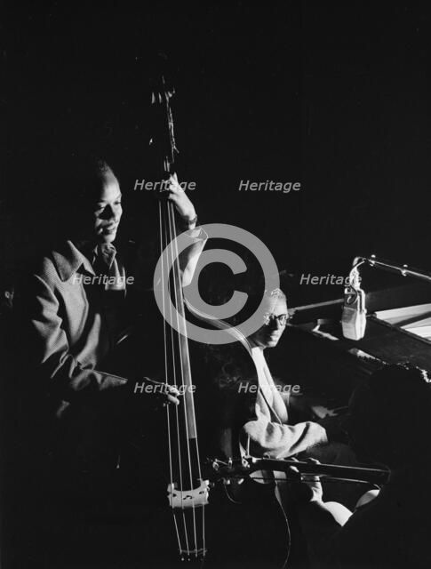 Portrait of Wesley Prince, Nat King Cole, and Freddie Moore, New York, N.Y., ca. July 1946. Creator: William Paul Gottlieb.