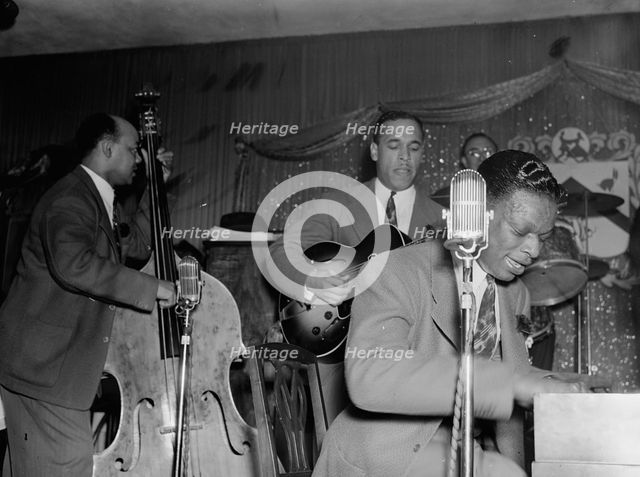 Portrait of Wesley Prince, Oscar Moore, and Nat King Cole, Zanzibar, New York, N.Y., ca. July 1946. Creator: William Paul Gottlieb.
