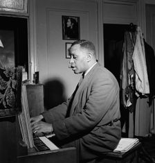 Portrait of Willie Smith in his apartment, Manhattan, New York, N.Y., ca. Jan. 1947. Creator: William Paul Gottlieb