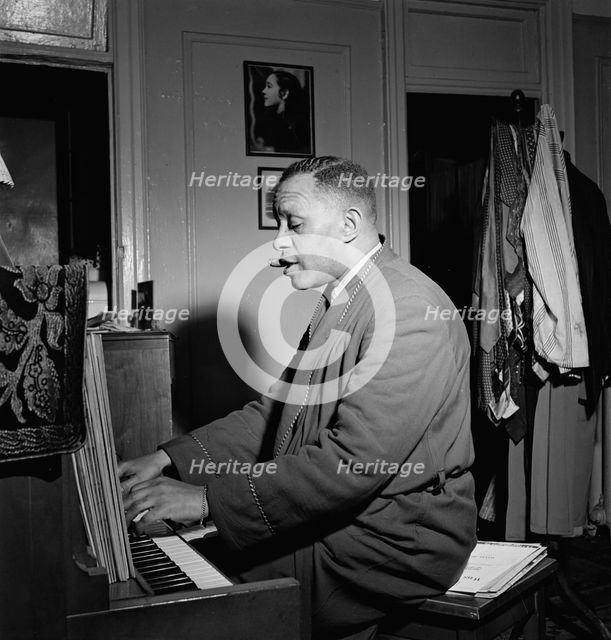 Portrait of Willie Smith in his apartment, Manhattan, New York, N.Y., ca. Jan. 1947. Creator: William Paul Gottlieb.