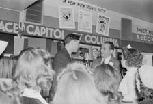 Portrait of Tommy Dorsey and William P. Gottlieb, record store, Washington, D.C., ca. 1940. Creator: Delia Potofsky Gottlieb