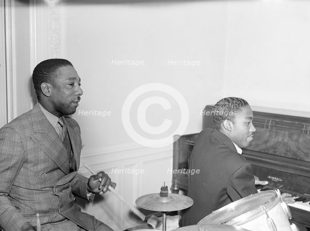 Portrait of Tommy Myles and John Malachi, Turkish Embassy, Washington, D.C., 1938. Creator: William Paul Gottlieb.