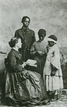 Portrait of teacher Laura M. Towne, a founder of the Penn School, with students..., February 1866. Creator: Unknown