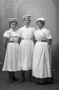 Portrait of three female dairy workers, Landskrona, Sweden, 1910