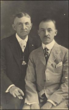 Portrait of Two Men with Suit Accessories, 1907-1943. Creator: Louis Fleckenstein