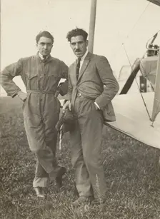 Portrait of two men by plane, 1915-1930. Creator: Fédèle Azari