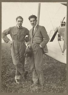 Portrait of two men by plane, 1915-1930. Creator: Fédèle Azari