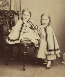 Portrait of Two Girls in Matching Capes, late 19th century. Creator: Unknown