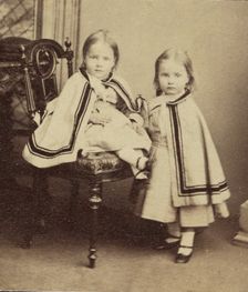 Portrait of Two Girls in Matching Capes, late 19th century. Creator: Unknown