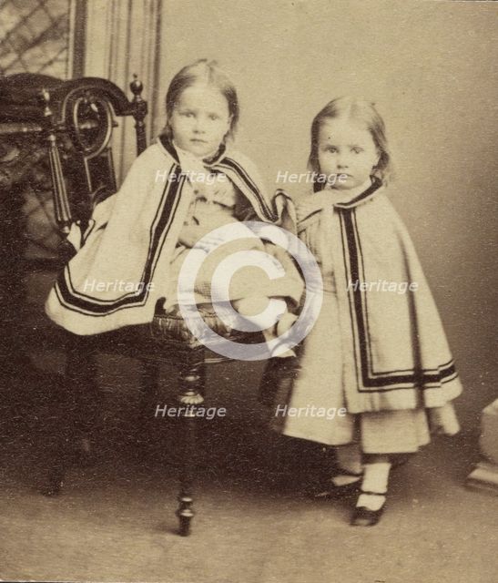 Portrait of Two Girls in Matching Capes, late 19th century. Creator: Unknown.