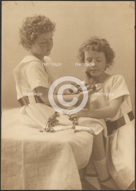 Portrait of Two Sisters Holding Statue and Wreath, 1907-1943. Creator: Louis Fleckenstein.