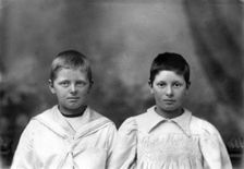 Portrait of two unknown siblings (brother and sister), c1900s. Creator: Robert Augustus Henry L'Estrange