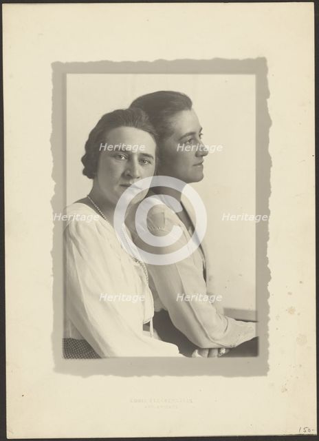 Portrait of Two Women Against White Backdrop, 1907-1924. Creator: Louis Fleckenstein.