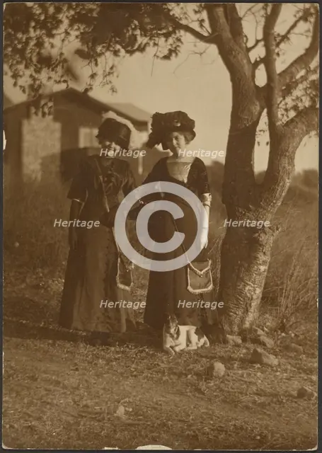 Portrait of Two Women Dressed Up in the Backyard, 1907-1943. Creator: Louis Fleckenstein.