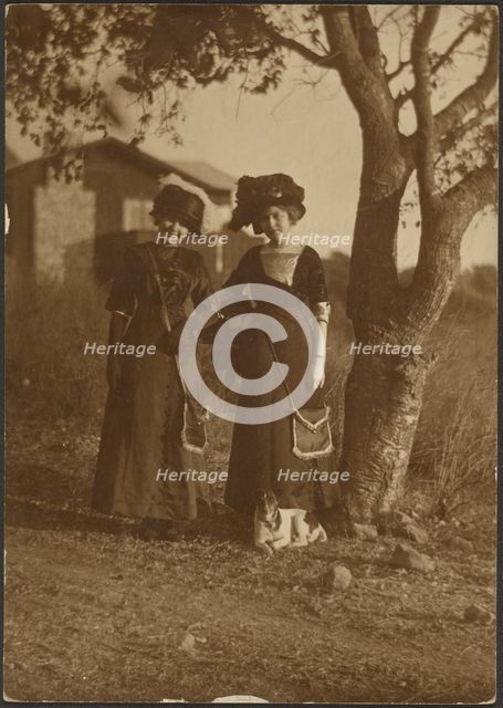 Portrait of Two Women Dressed Up in the Backyard, 1907-1943. Creator: Louis Fleckenstein.