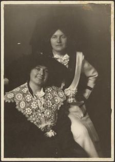 Portrait of Two Women in Ornate Outfits, 1907-1943. Creator: Louis Fleckenstein