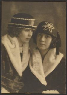 Portrait of Two Women in Hats with White Piping, 1907-1943. Creator: Louis Fleckenstein