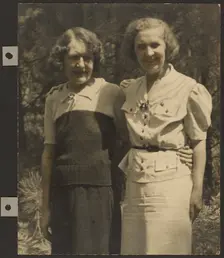 Portrait of Two Women Standing Outside, 1895-1943. Creator: Louis Fleckenstein