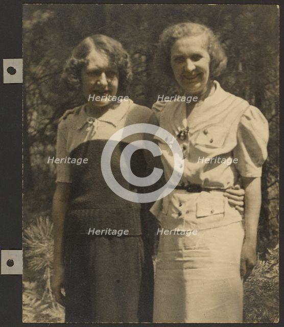 Portrait of Two Women Standing Outside, 1895-1943. Creator: Louis Fleckenstein.