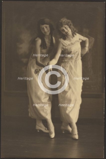 Portrait of Two Young Women in Matching Dresses, 1907-1924. Creator: Louis Fleckenstein.