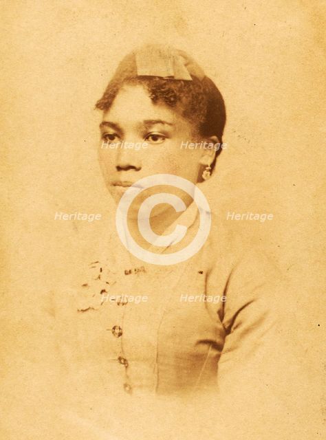 Portrait of unidentified young woman wearing ribbon on head, c1880-c1889. Creator: JW Perkins.