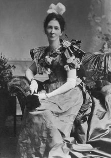 Portrait of unknown lady in a party dress, c1900s. Creator: Robert Augustus Henry L'Estrange