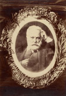 Portrait of Victor Hugo framed by wreath, about 1870-1885. Creator: Unknown
