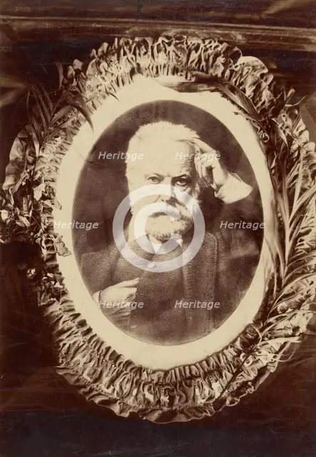 Portrait of Victor Hugo framed by wreath, about 1870-1885. Creator: Unknown.