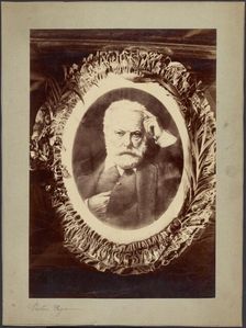 Portrait of Victor Hugo framed by wreath, about 1870-1885. Creator: Unknown