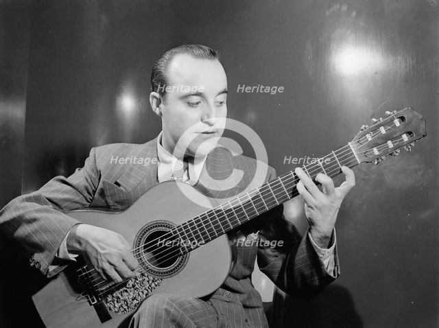 Portrait of Vincente Gomez, Café Society Uptown(?), New York, N.Y., ca. June 1946. Creator: William Paul Gottlieb.