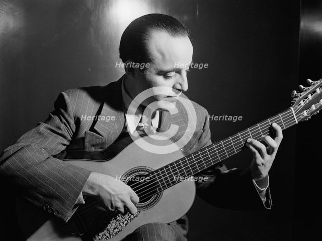 Portrait of Vincente Gomez, Café Society Uptown(?), New York, N.Y., ca. June 1946. Creator: William Paul Gottlieb.
